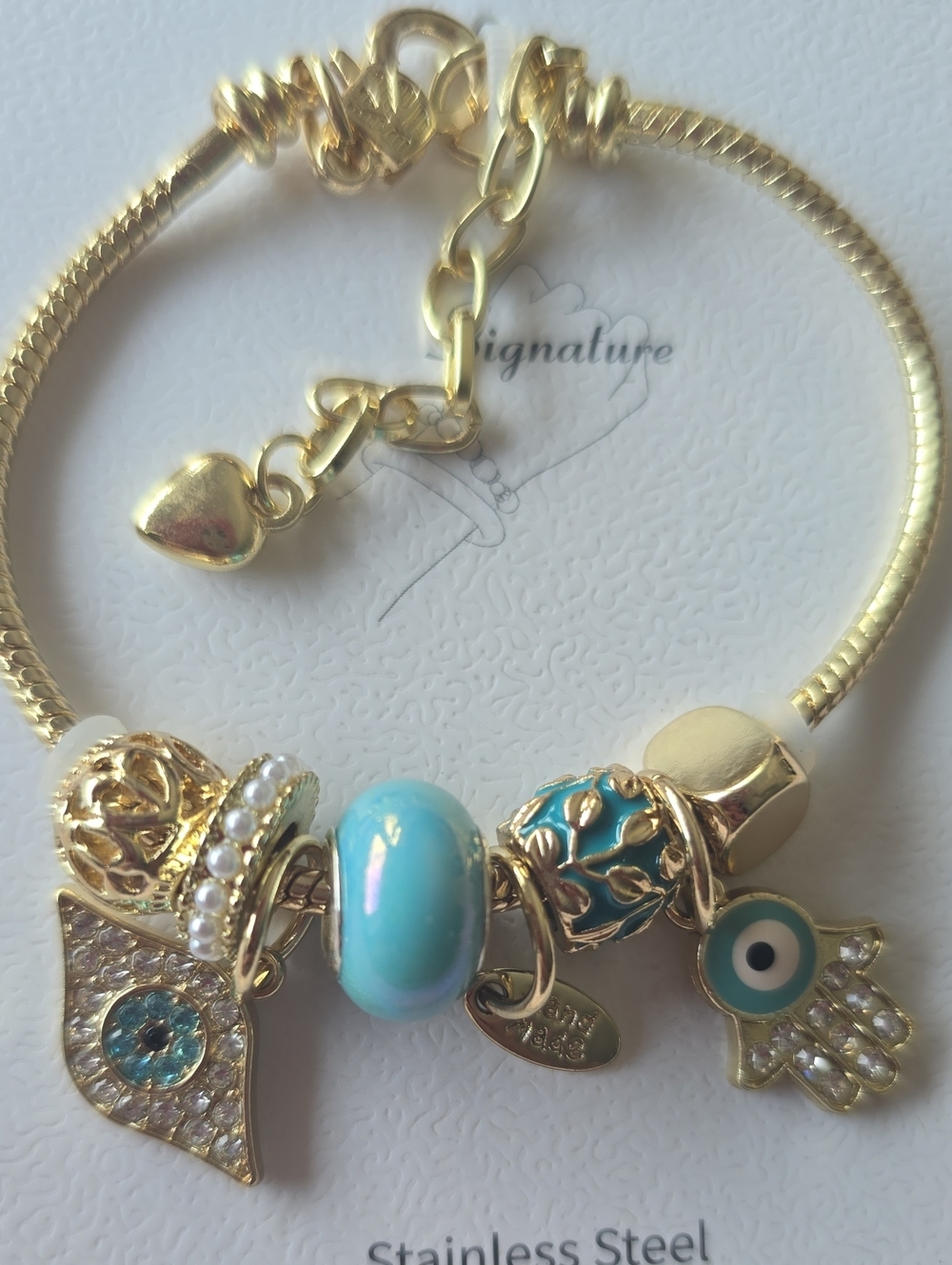 Gold Charm Bracelet with Evil Eye and Blue Bead